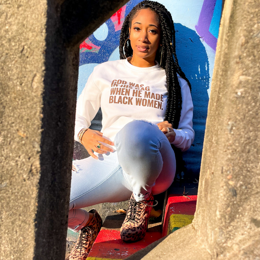 Cream sweatshirt with chocolate writing and pouch. God was in his bag when he made black women.