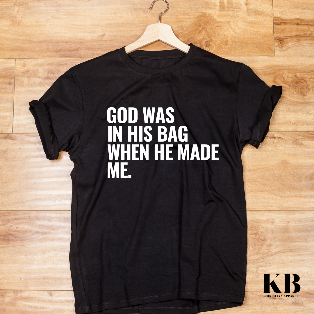 Black crewneck t-shirt. God was in his bag when he made me.